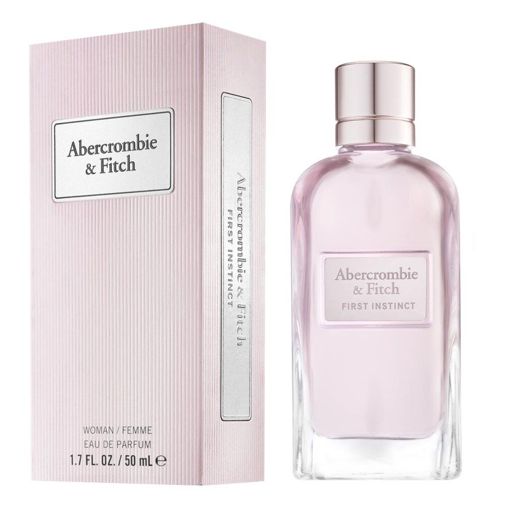 Rosafarbene Verpackung und Flakon. Aufschrift: Abercrombie & Fitch, First Instinct, Woman/Femme, Eau de Parfum.