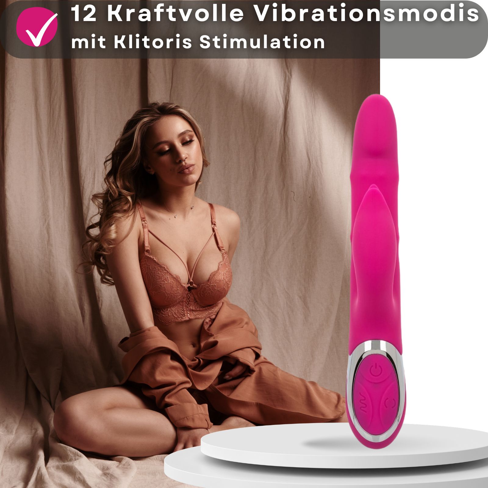 Pinkfarbener Vibrator. 12 Vibrationsmodi. Mit Klitoris Stimulation. Auf weißem Hintergrund.