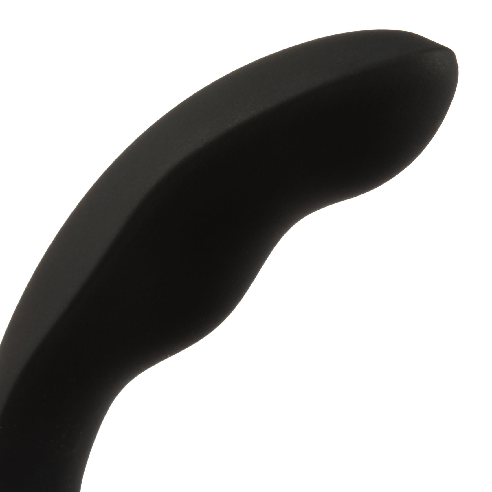Nahaufnahme des gebogenen Teils eines schwarzen Silikon-Vibrators. Glatte Oberfläche.