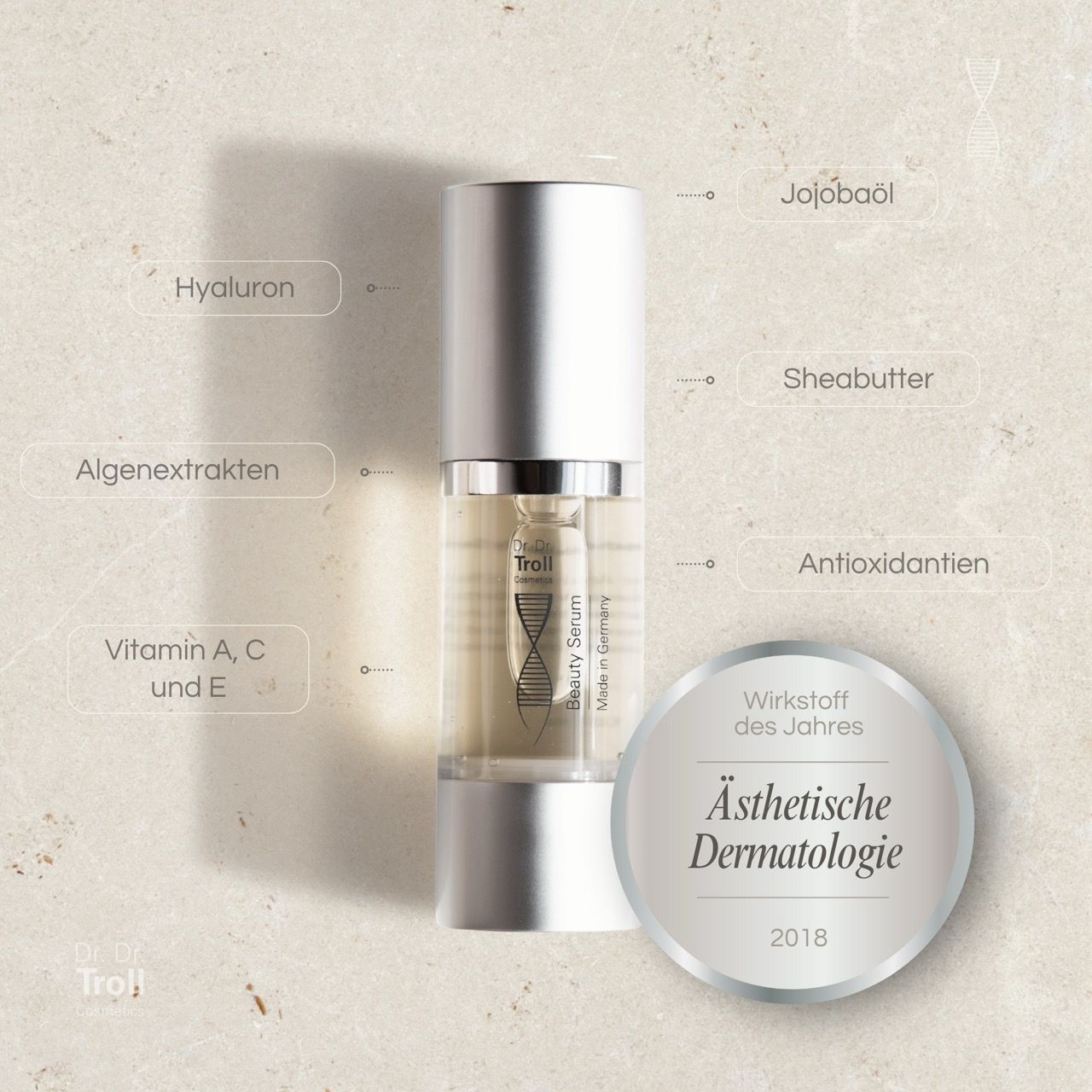 Dr. Dr. Troll Beauty Serum. Flasche mit silberner Kappe. Inhaltsstoffe: Hyaluron, Jojobaöl, Sheabutter, Antioxidantien, Vitamine.