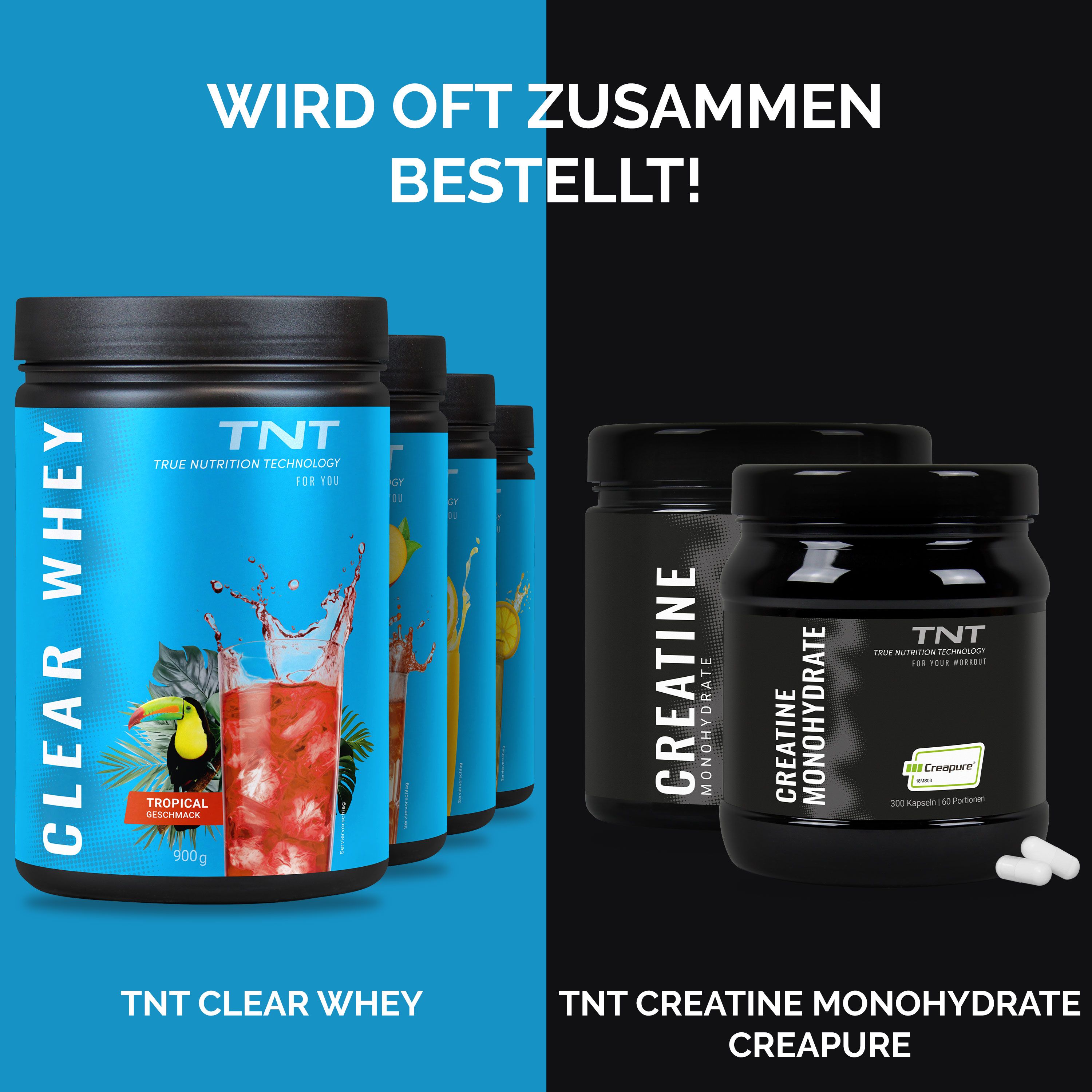 TNT CLEAR WHEY und TNT Creatine Monohydrate. Mehrere Dosen CLEAR WHEY, eine Dose Creatine. Weiße Tabletten.