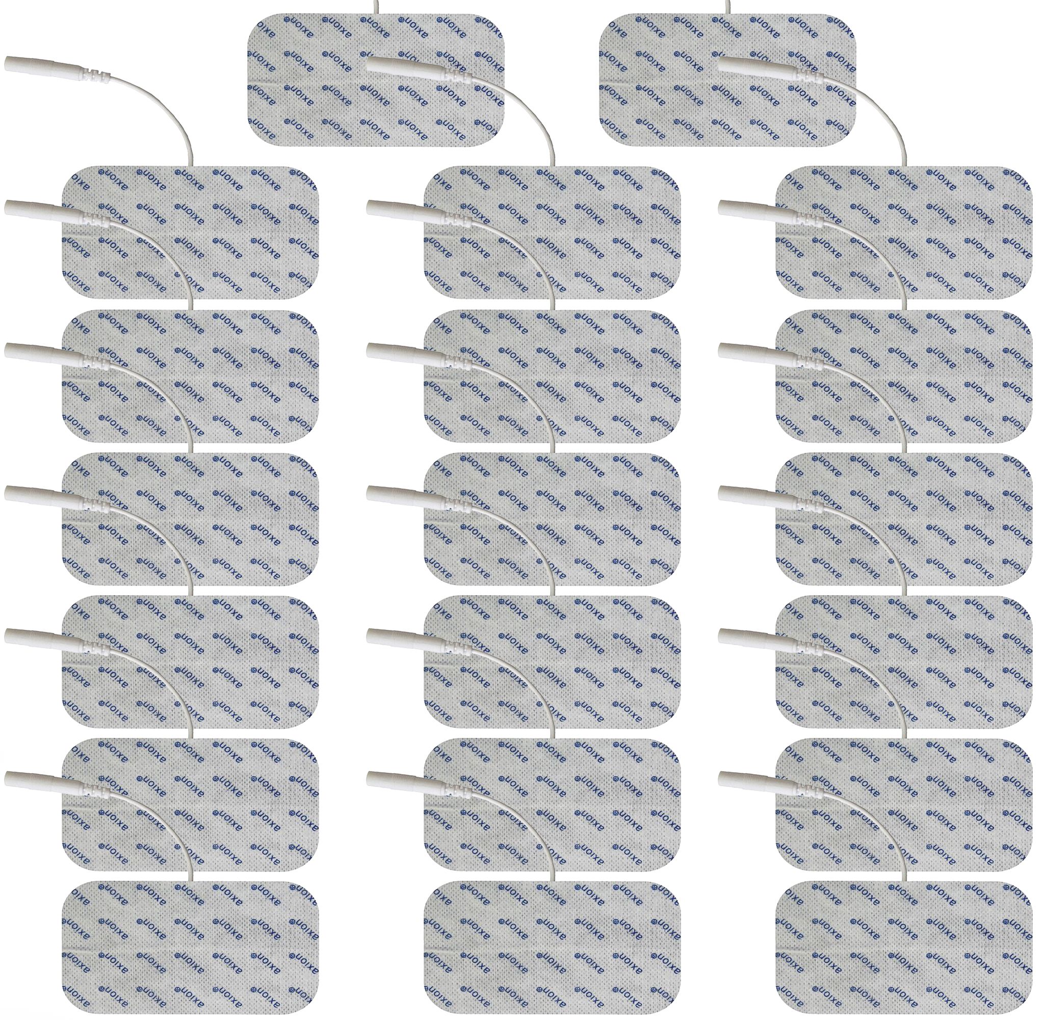 Plusieurs coussinets d'électrodes avec câble. Impression : axion. Fond blanc.