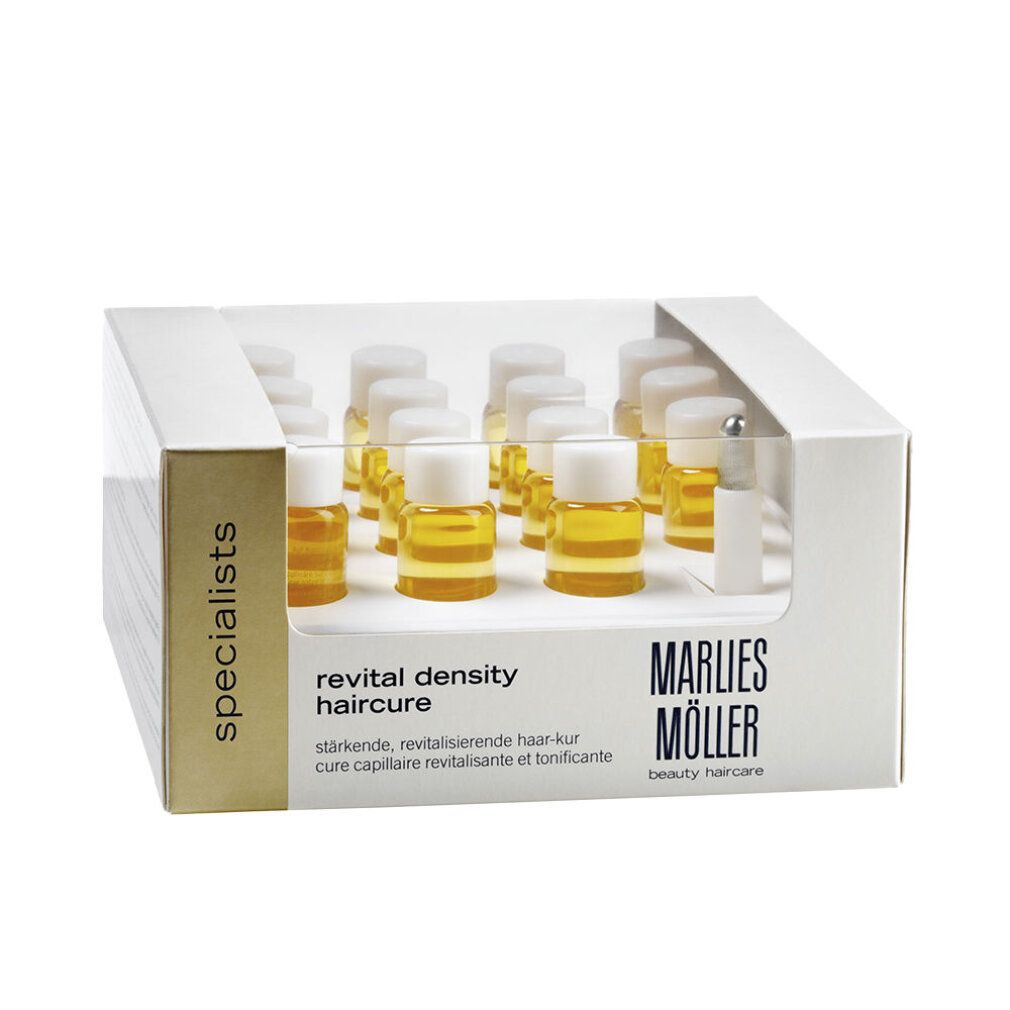 Weißer Karton mit mehreren kleinen Fläschchen. Aufschrift: Marlies Möller, Revital Density Haircure.