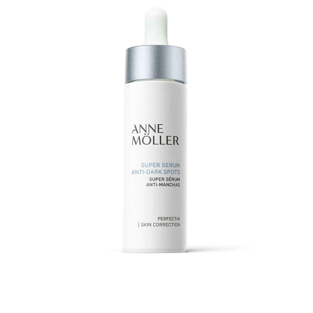Weiße Flasche mit silbernem Deckel und Pipette. Aufschrift: Anne Möller, Super Serum Anti-Dark Spots.