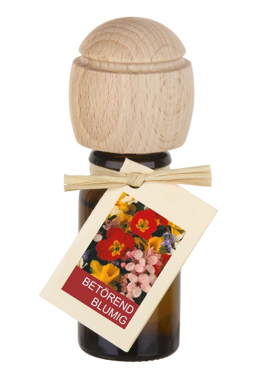 Braune Glasflasche mit Holzverschluss und Etikett. Etikett mit Blumenmotiv und Text: BETÖREND BLUMIG.