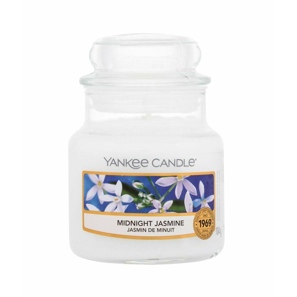 Yankee Candle Duftkerze Midnight Jasmine im kleinen Glas. Mit Deckel. Aufkleber mit Blumenmotiv und Produktbezeichnung. Qualitätsauszeichnung.