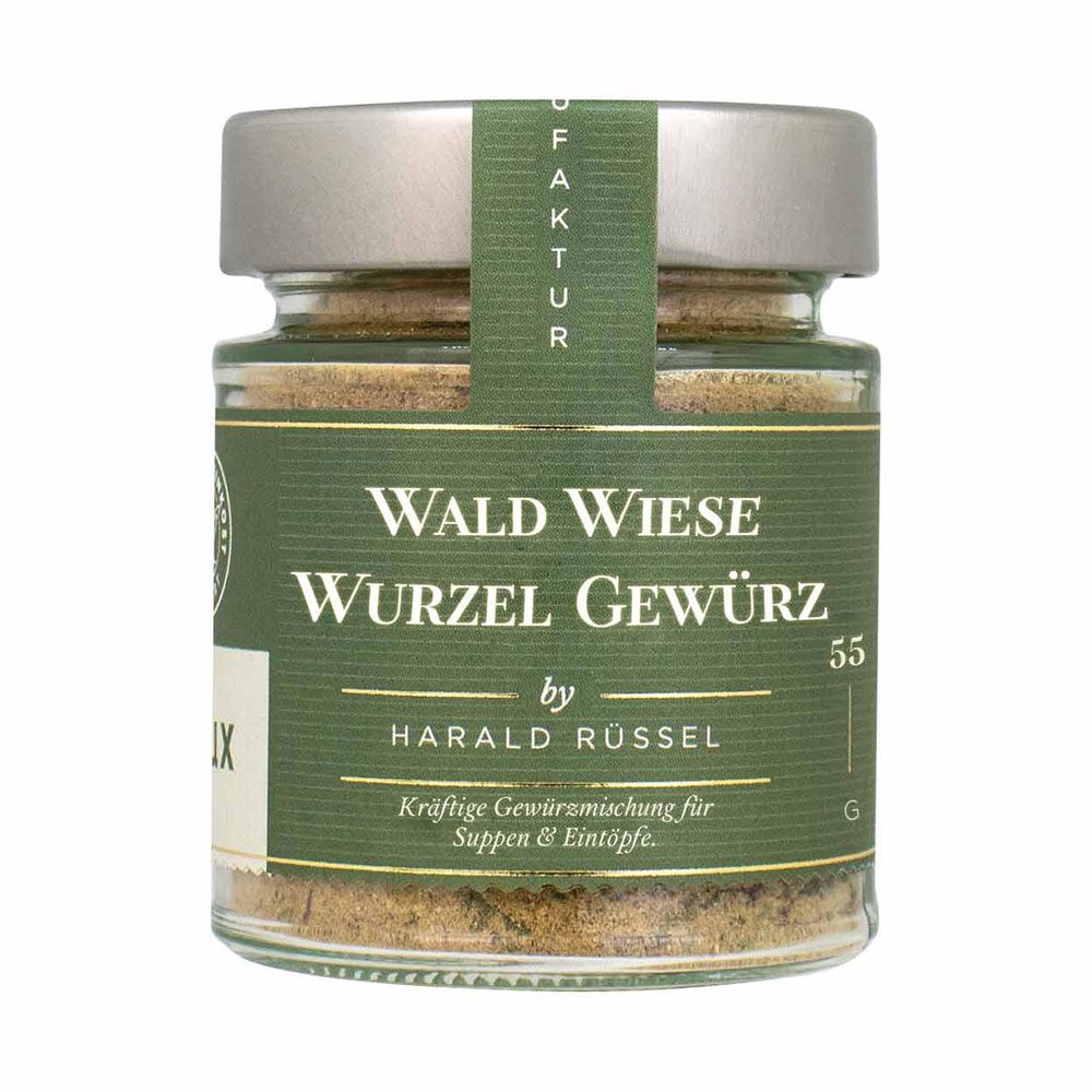 Glas mit Gewürz. Aufschrift: Wald Wiese Wurzel Gewürz by Harald Rüssel. Etikett mit Text.