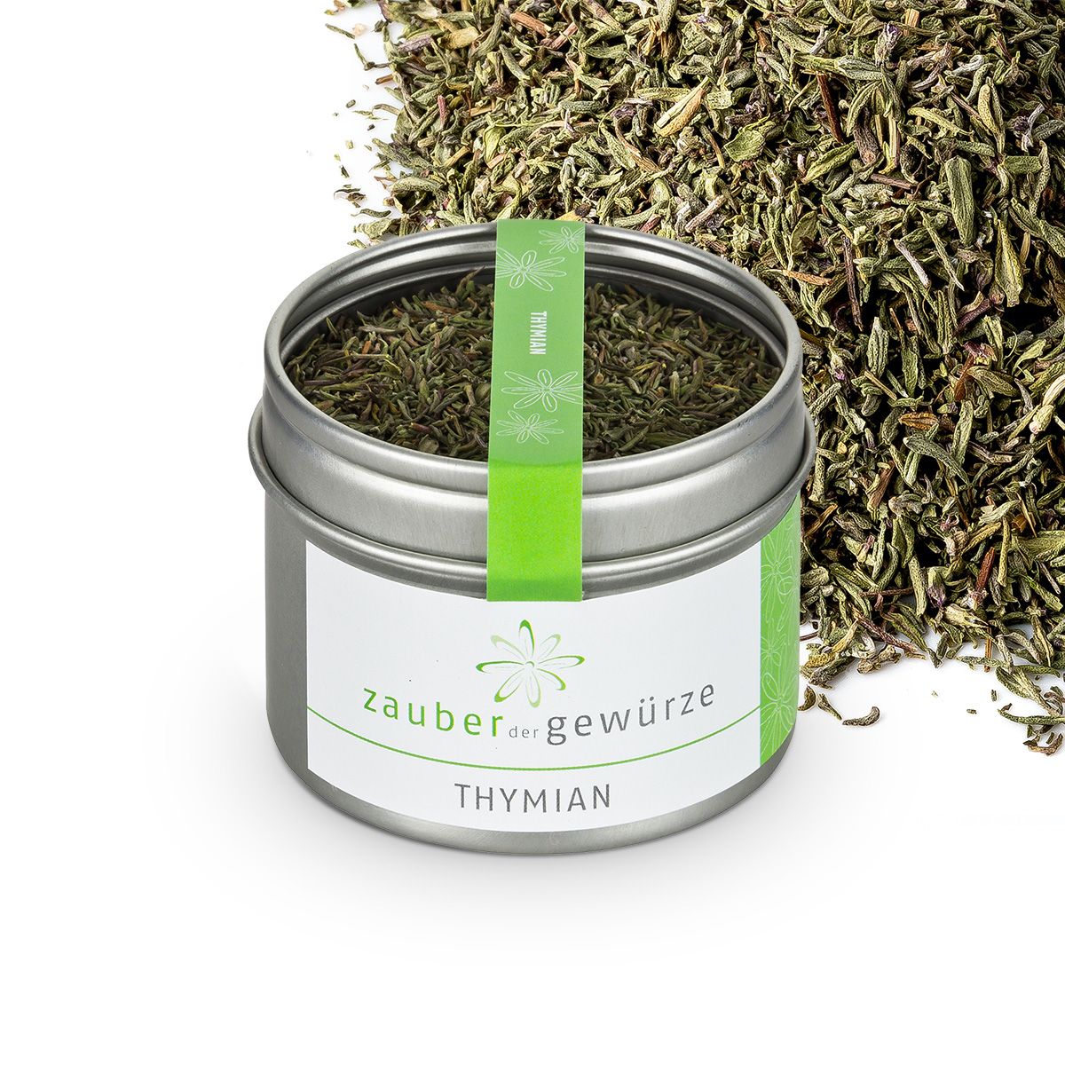 Runde Dose mit Thymian-Gewürz. Etikett mit "Zauber der Gewürze" und "Thymian". Grüner Streifen mit "Thymian". Thymian daneben.
