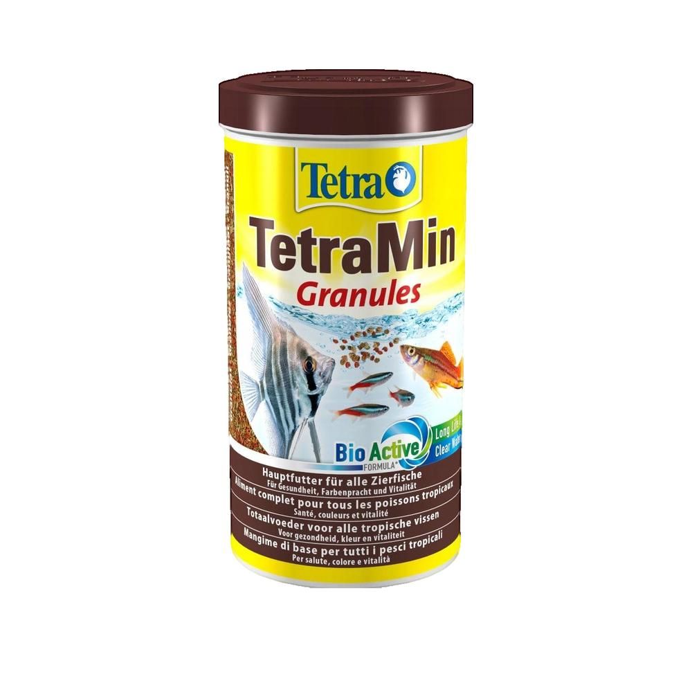 Zylindrische Dose mit braunem Deckel. Gelbes Etikett mit Produktnamen und Fischabbildung. Text in mehreren Sprachen.