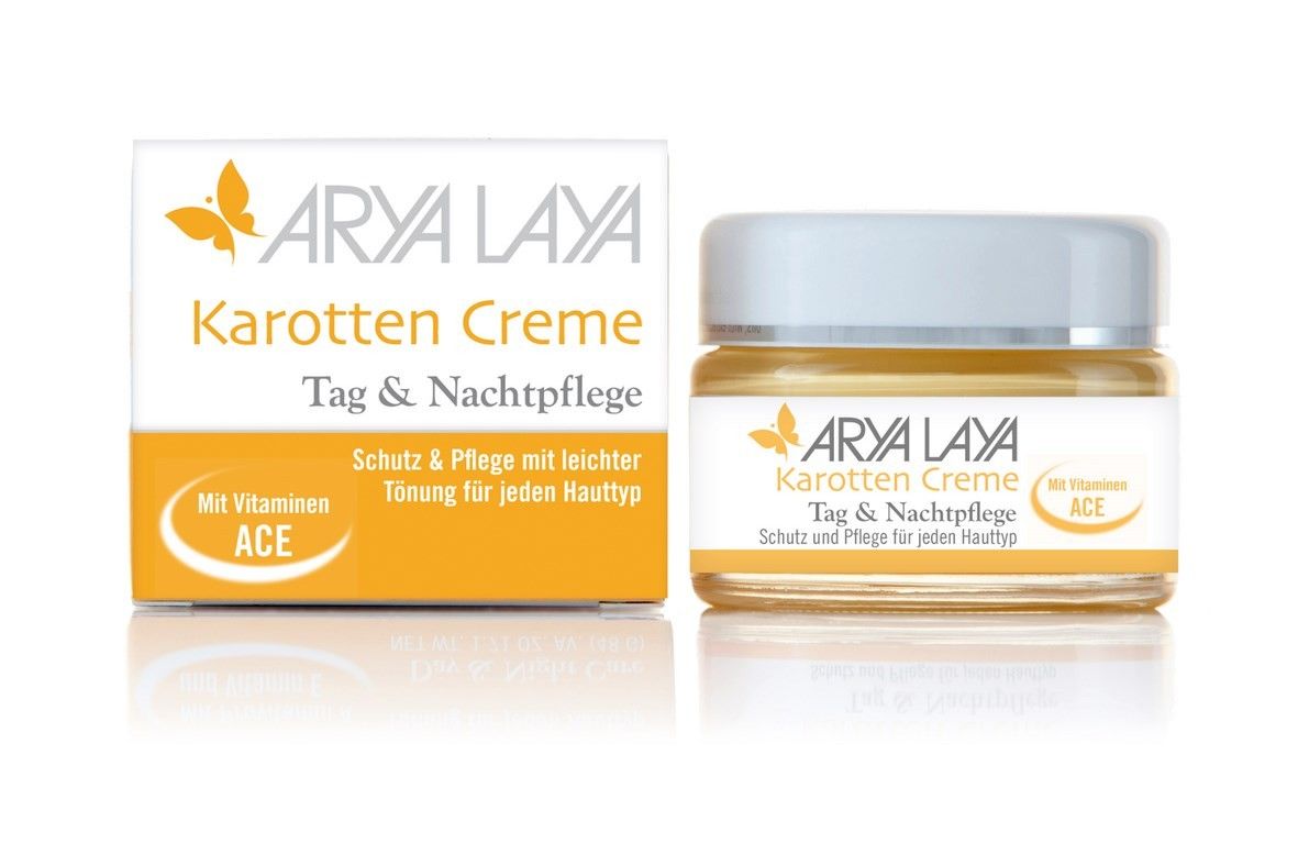 Creme-Glas und Schachtel. Aufschrift: Arya Laya Karotten Creme Tag & Nachtpflege. Mit Vitaminen ACE. Schutz & Pflege für jeden Hauttyp.