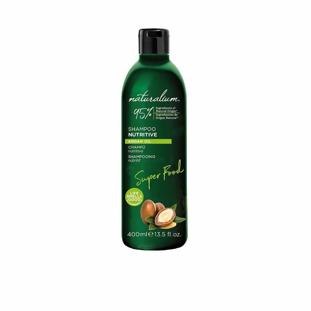 Grüne Shampoo-Flasche mit schwarzem Deckel. Aufschrift: Naturalium, Shampoo Nutritivo Argan Oil, Super Food. Abbildung von Argan-Früchten.