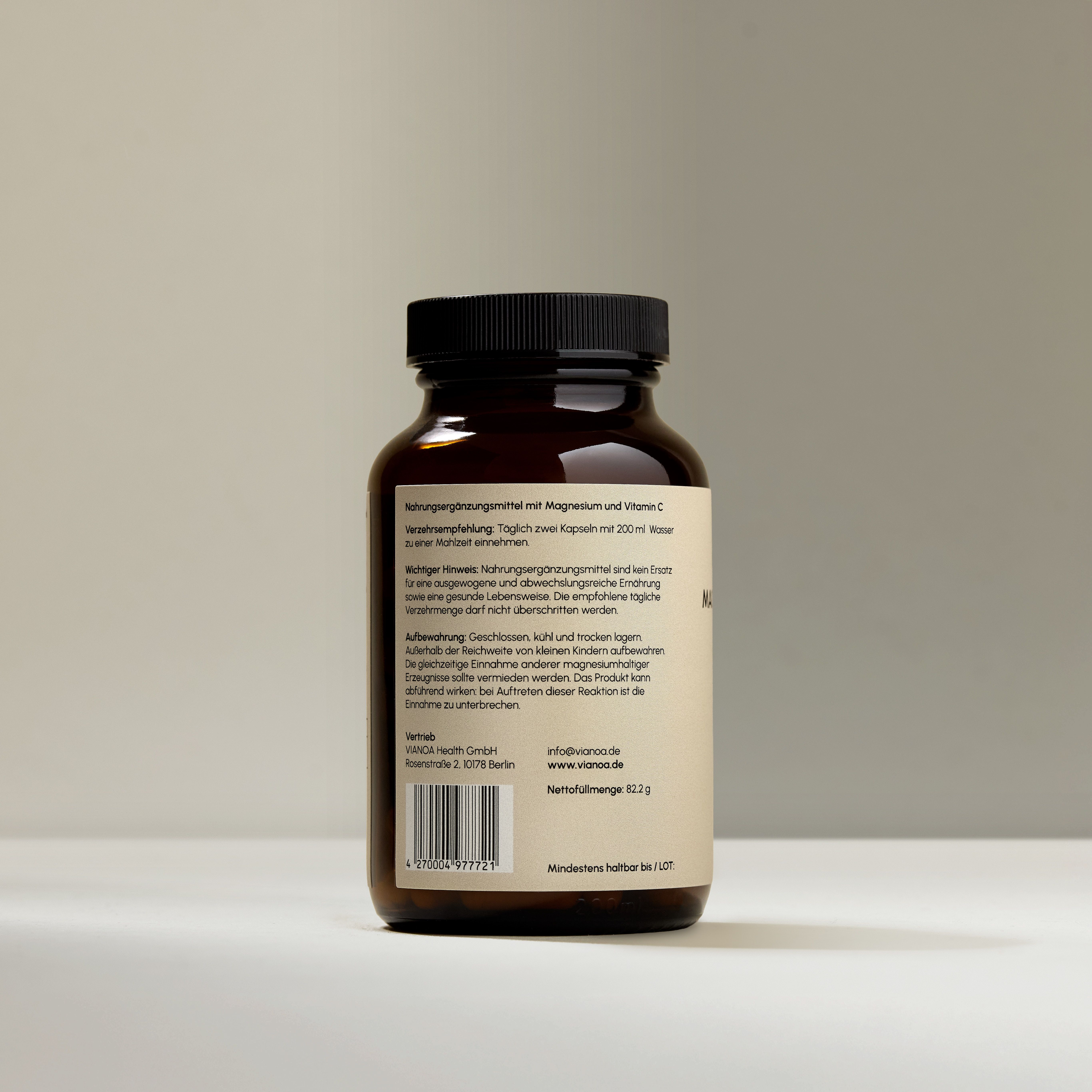 Rückseite einer VIANOA Magnesium Komplex Flasche mit detaillierten Anwendungshinweisen und Inhaltsstoffen auf dem Etikett.