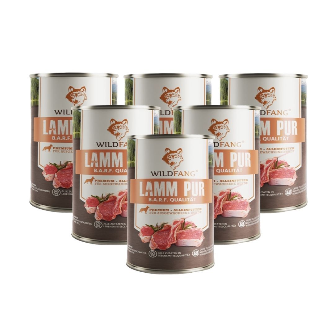 Sieben Dosen Wildfang Lamm Pur Hundefutter. Aufschrift: Lamm Pur, BARF Qualität. Abbildung von Lammfleisch.