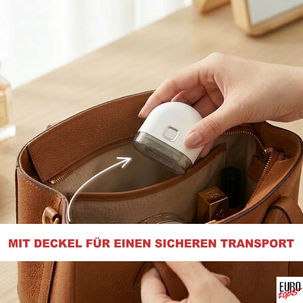 Hand legt elektrischen Nagelschneider mit Deckel in eine Handtasche.