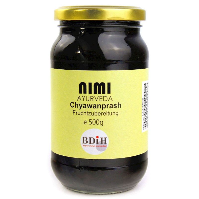 Glasbehälter mit goldfarbenem Deckel. Auf gelbem Etikett: Nimi Ayurveda Chyawanprash Fruchtzubereitung. BDIH-Siegel.