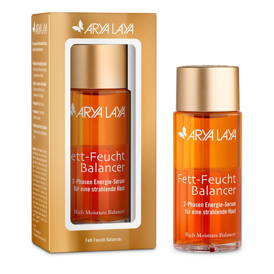 Arya Laya Fett-Feucht Balancer Serum in orangefarbener Flasche mit goldenem Verschluss, im Karton.