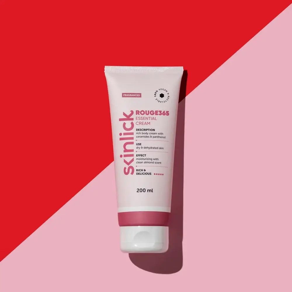 Creme-Tube SKINLICK Rouge365 Essential Cream. Rosa Tube mit weißem Deckel. Hintergrund: Rot und Rosa.