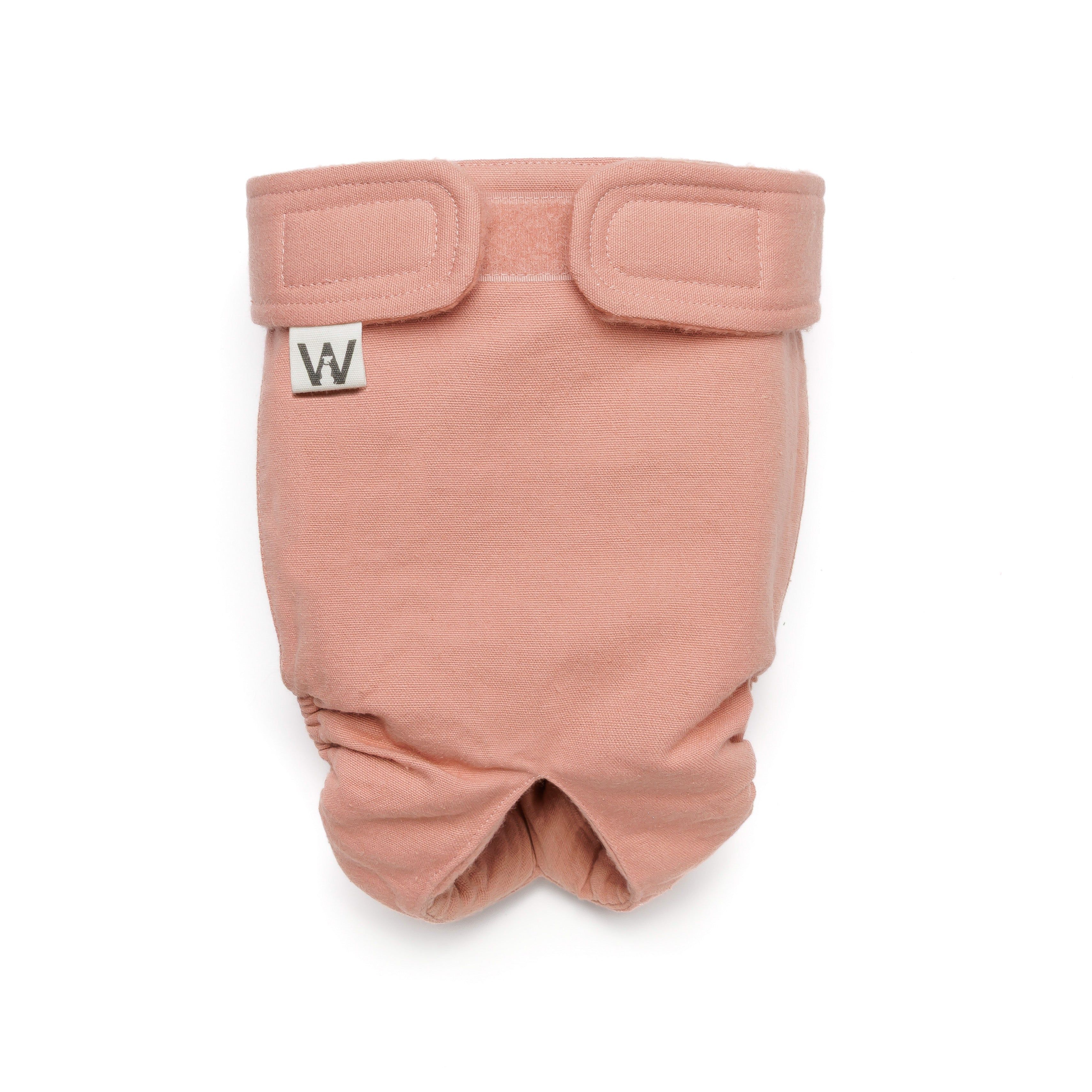 Rosa Läufigkeitshöschen mit Klettverschlüssen und Logo-Etikett. Baumwollstoff, Ansicht von vorne.