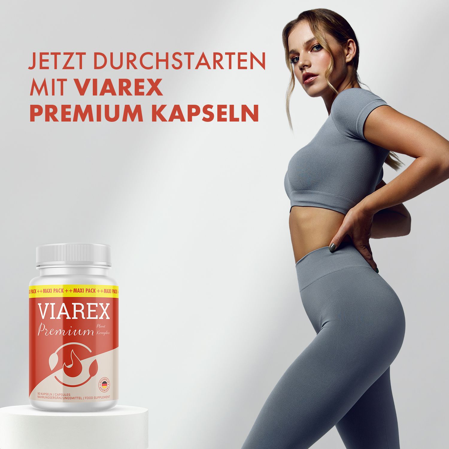 Eine Frau steht neben einer Flasche Viarex Premium. Text: Jetzt durchstarten mit Viarex Premium Kapseln.