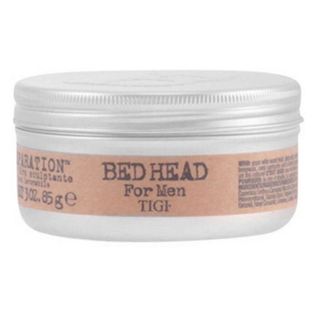 Runde Dose mit silbernem Deckel. Aufkleber mit "Bed Head For Men Tigi" und Produktinformationen.