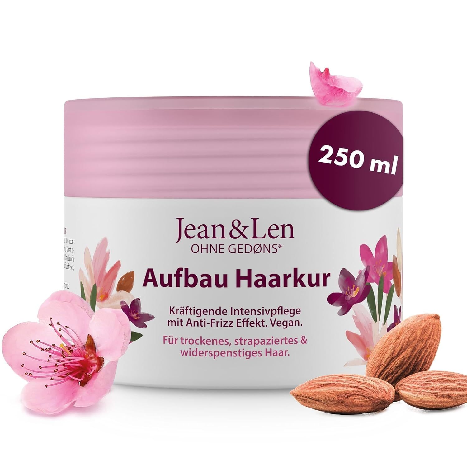 Jean & Len Aufbau Haarkur Cremebehälter mit Mandeln und Blüten. Text: 250 ml. Kräftige Intensivpflege mit Anti-Frizz Effekt.