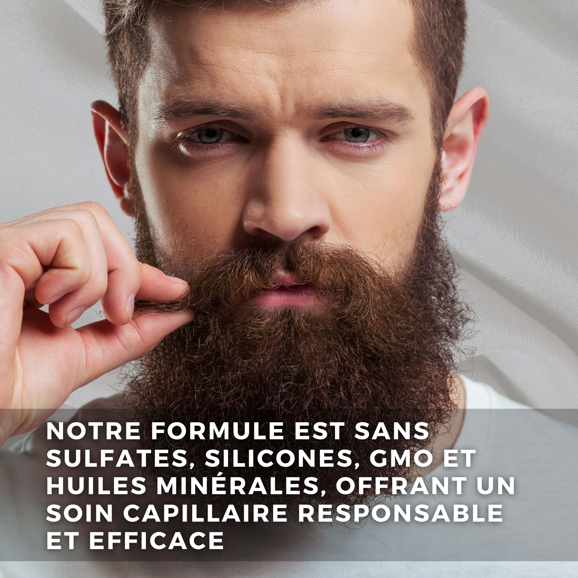 Homme avec barbe. Texte : Notre formule est sans sulfates, silicones, OGM et huiles minérales.