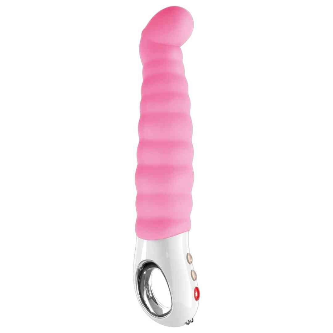Rosa Vibrator mit geriffelter Oberfläche und weißem Griff. Drei Knöpfe und ein Loch am Griff.