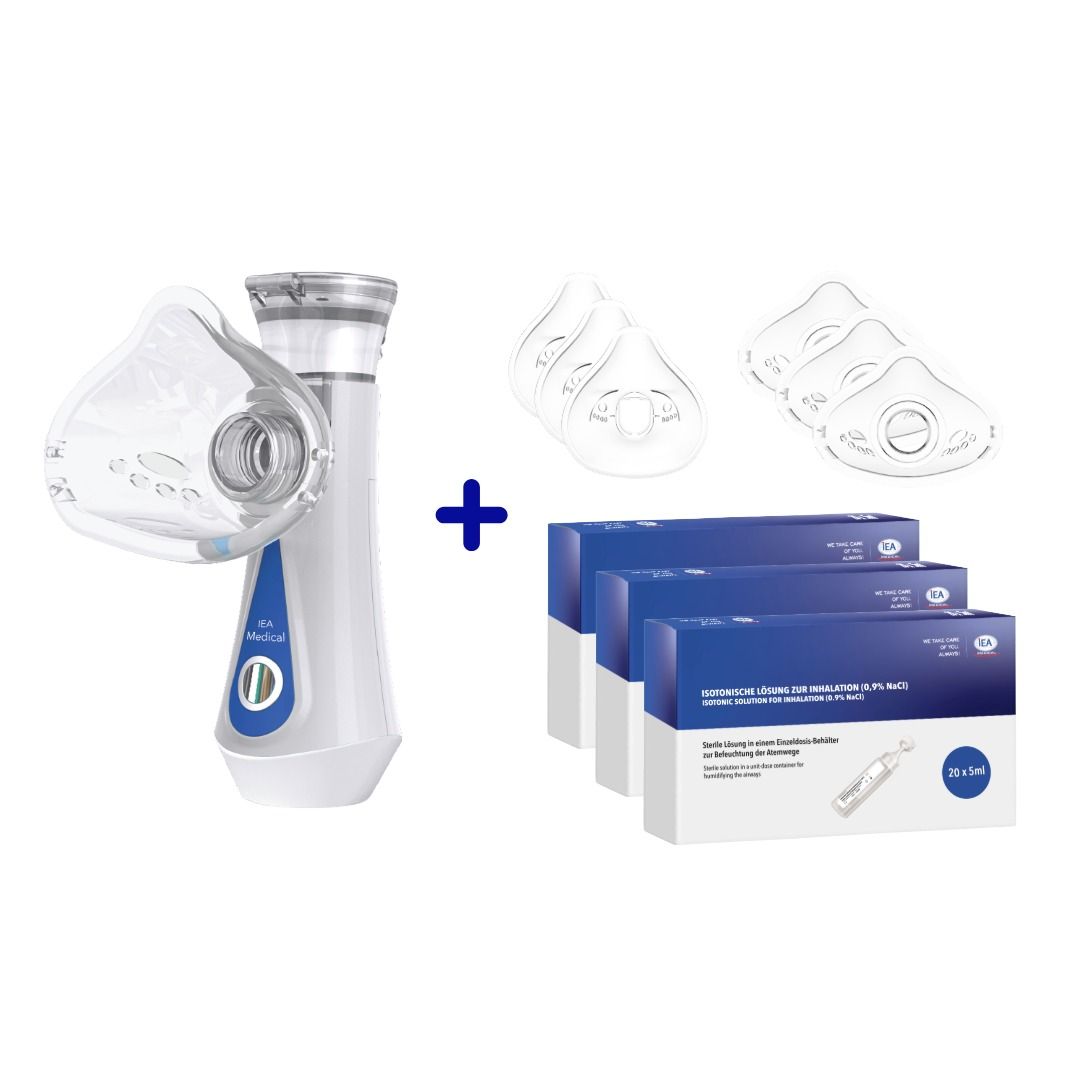 Inhalator, Masken und Kochsalzlösung. Inhalator mit Maske, Ersatzmasken und Kochsalzlösung in Kartons.