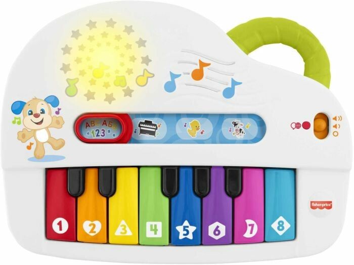 Weißes Spielzeug-Keyboard mit bunten Tasten. Mit Griff, Knöpfen und einem Cartoon-Hund. Das Keyboard hat die Marke Fisher Price.
