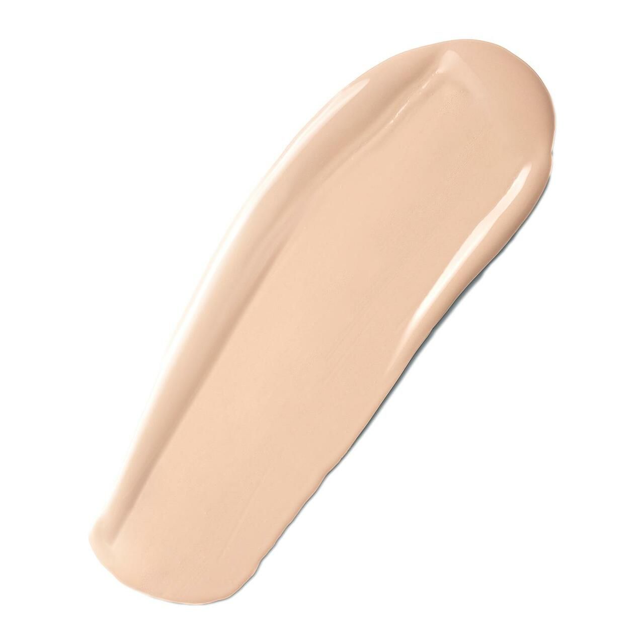 Beiger Foundation-Strich auf weißem Hintergrund. Glatte Textur, leicht glänzend. Keine Produktbezeichnung sichtbar.