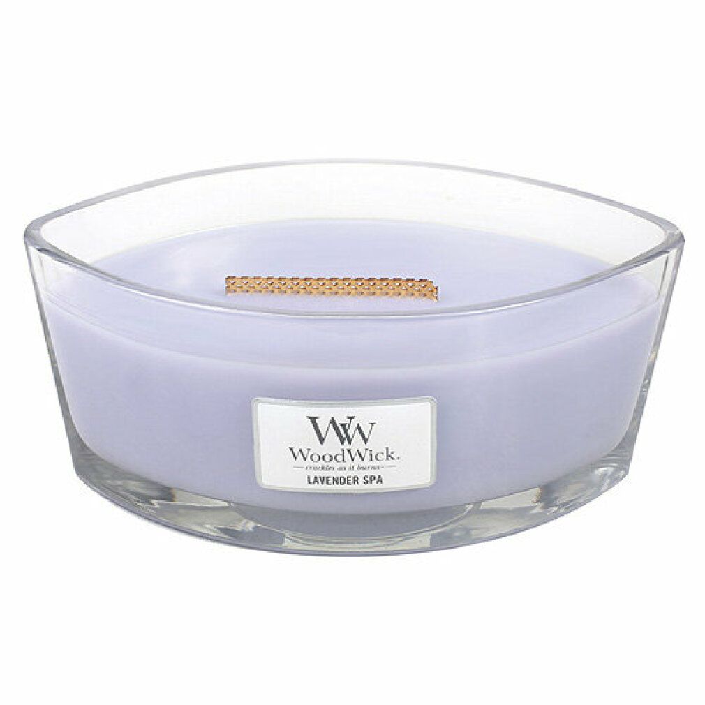 Glasbehälter mit lila Wachs und Holzdocht. Aufschrift: WoodWick, Lavender Spa. Ellipsenförmig.