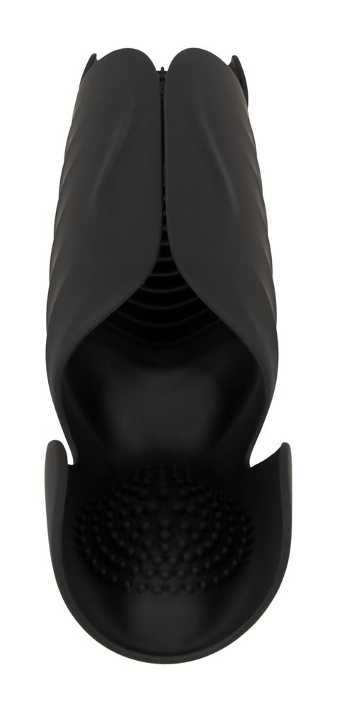 Schwarzes Produkt mit geriffelter Oberfläche und Noppen. Offene Form.