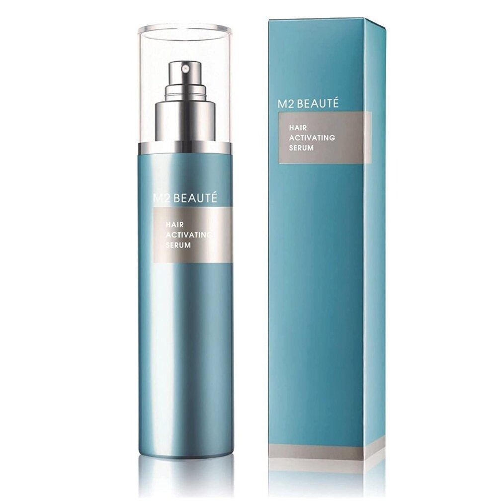 Blau-silberne Flasche mit Sprühkopf und Karton. Aufschrift: M2 Beauté, Hair Activating Serum.
