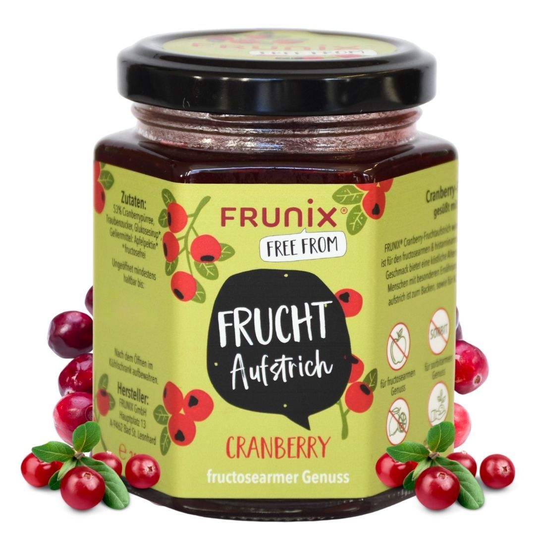 Glas FRUNIX® Cranberry-Fruchtaufstrich. Aufschrift: FRUNIX® FREE FROM, FRUCHTAUFSTRICH. Cranberry, fructosearmer Genuss. Rote Beeren.