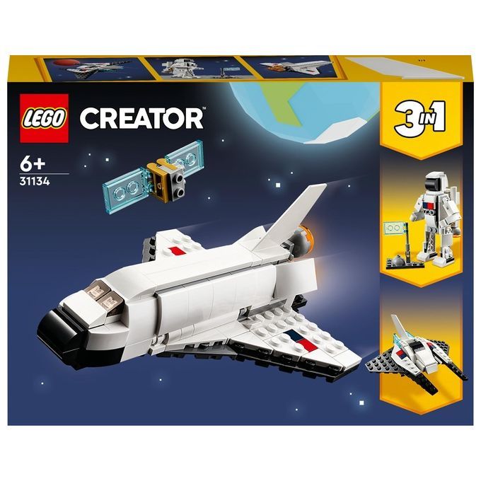 Set LEGO Creator 31134 Space Shuttle. La confezione mostra uno space shuttle bianco, un astronauta e un modello di astronave. Il set è adatto a bambini dai 6 anni in su. Il set 3 in 1 offre diverse opzioni di costruzione.
