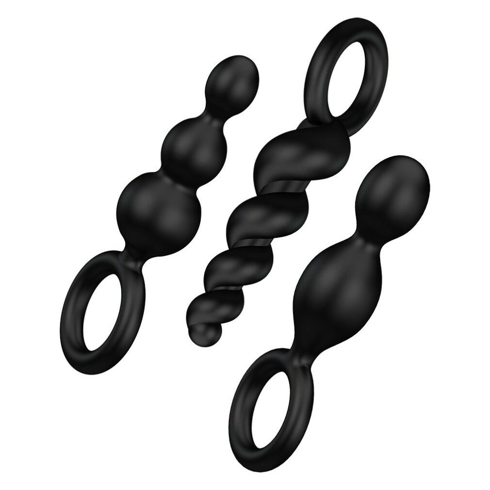 Drei schwarze Anal-Plugs mit Ringgriff. Verschiedene Formen: spiralförmig, rund und tropfenförmig.
