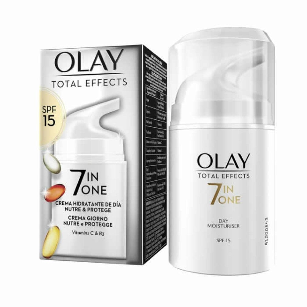 Creme-Spender und Verpackung. Olay Total Effects 7 in One, Day Moisturiser, SPF 15. Weißer Spender, weiße Schrift, Verpackung mit Produktabbildung.
