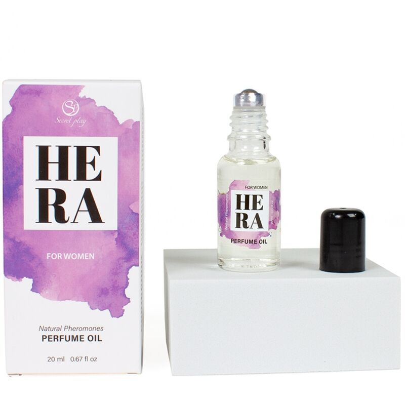 Hera Parfümöl für Frauen in einer Glasflasche mit Roll-On-Applikator und separatem Deckel, daneben die passende Verpackung.