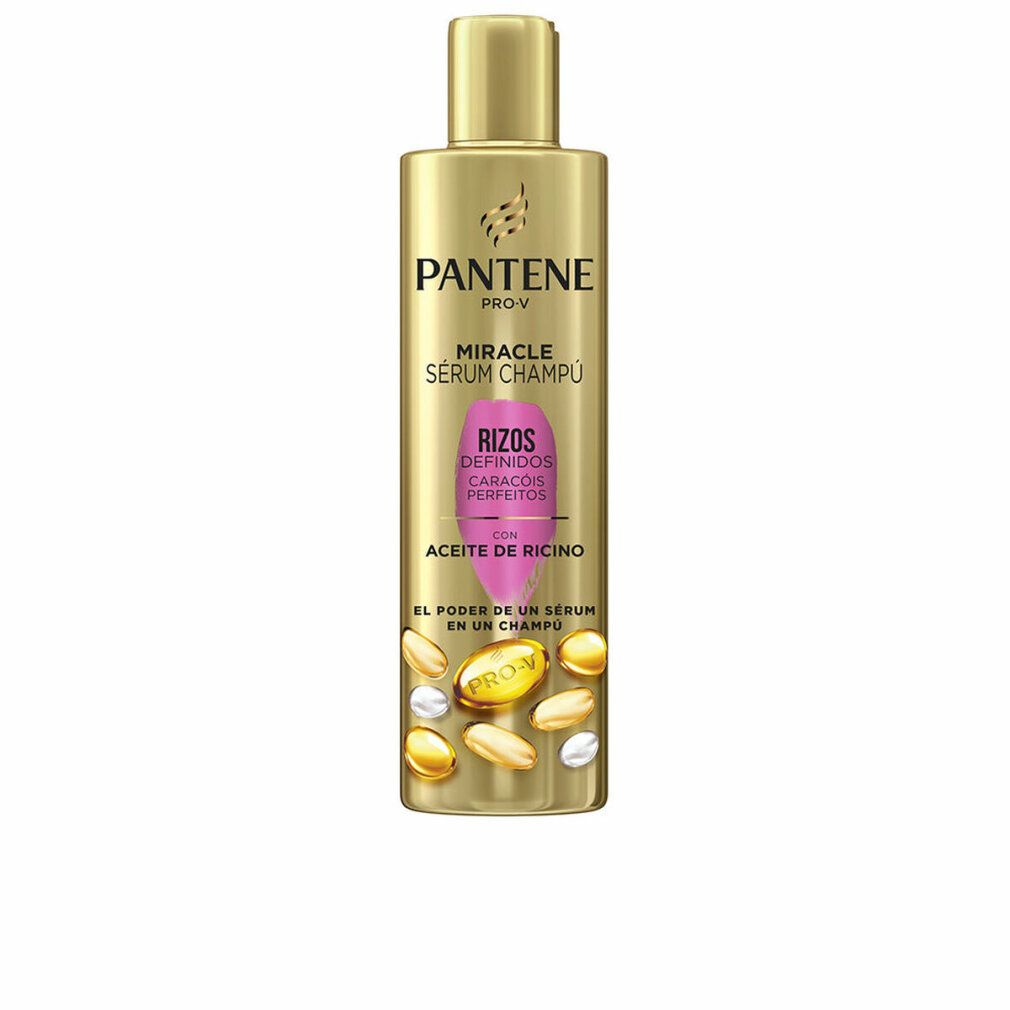 Goldfarbene Flasche mit Produktaufschrift. Text: PANTENE PRO-V MIRACLE SERUM CHAMPU. Für lockiges Haar. Mit Rizinusöl.