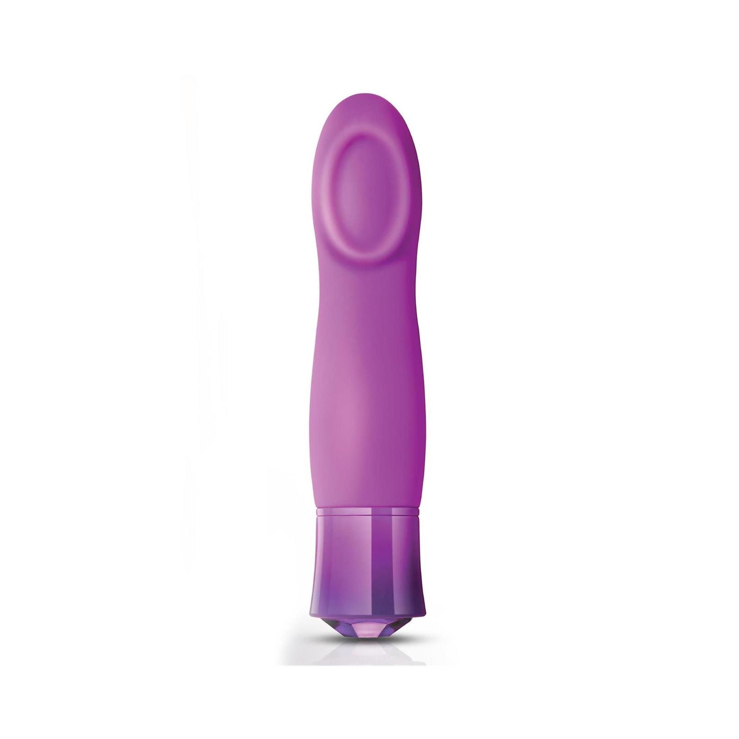 Lila Vibrator mit ovaler Spitze und Kristallspitze. Auf weißem Hintergrund.