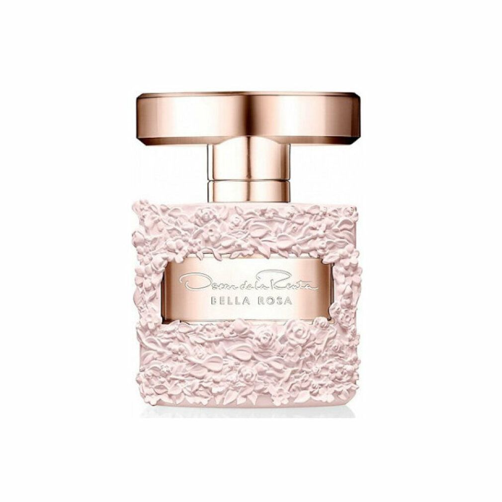 Rosa Parfümflakon mit floralem Relief. Goldfarbene Kappe. Aufschrift: Oscar de la Renta Bella Rosa.
