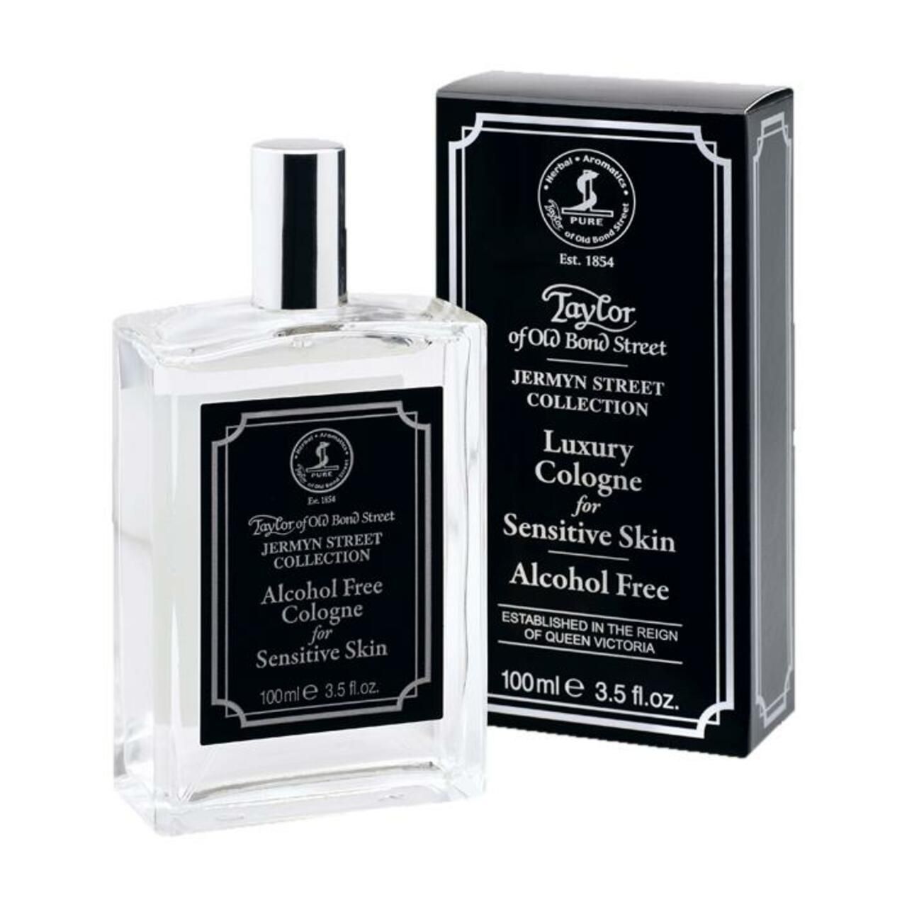 Klarflasche mit schwarzem Etikett und Text. Daneben eine schwarze Schachtel mit Text. "Alcohol Free Cologne for Sensitive Skin".