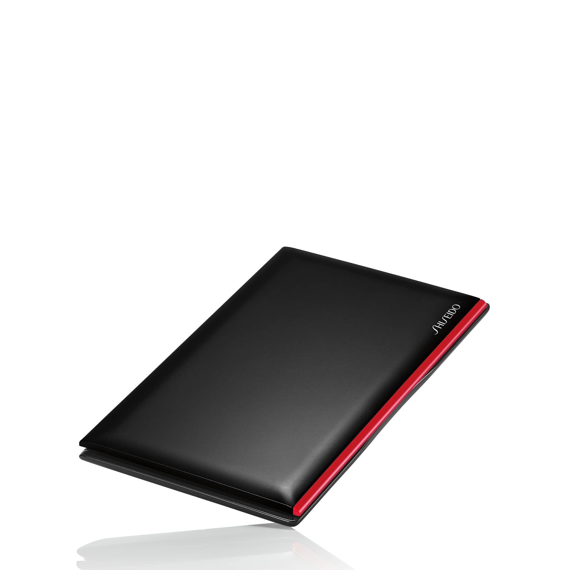 Schwarzes, rechteckiges Etui mit rotem Akzent. Marke Shiseido.