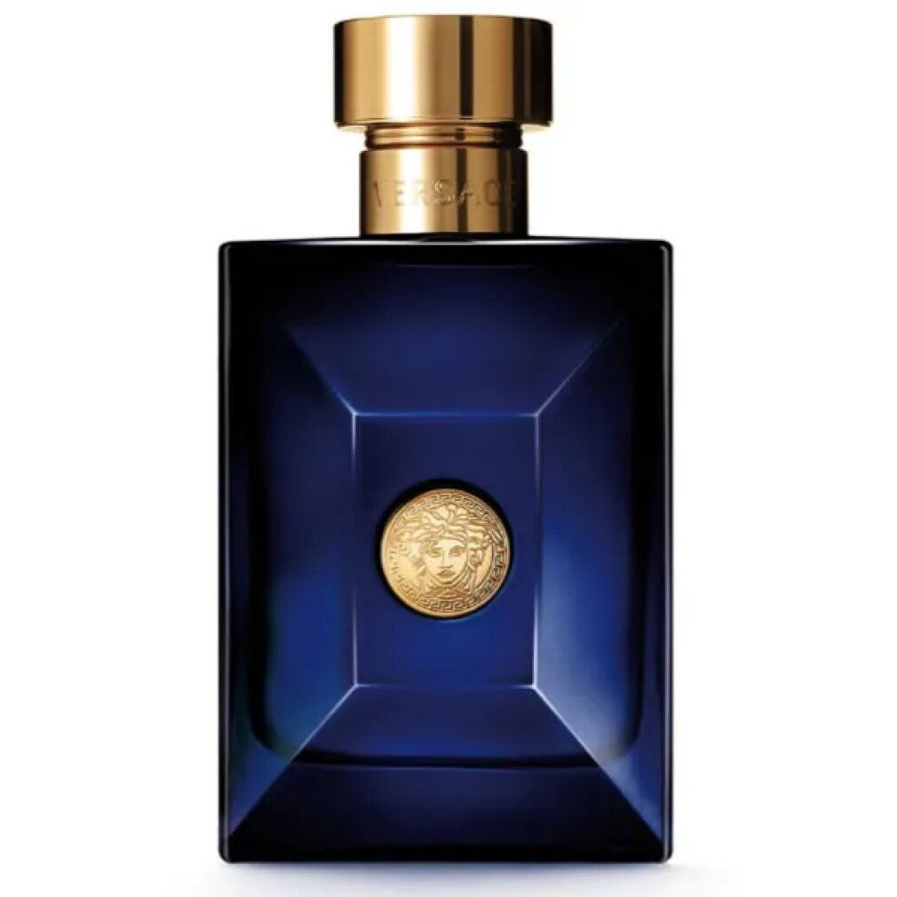 Dunkelblaue Glasflasche mit goldenem Verschluss und Medusa-Emblem.
