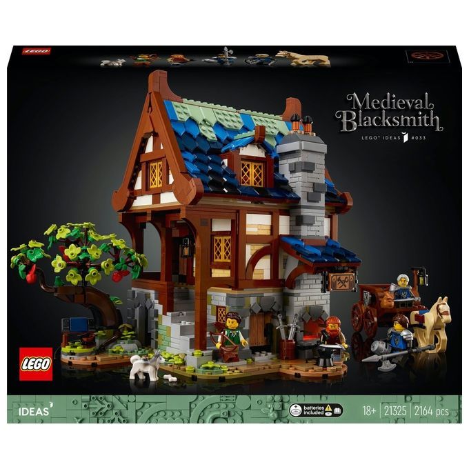 Set LEGO Ideas Fabbro. Il set mostra un edificio medievale con pareti marroni e bianche, un tetto blu e un camino. Ci sono anche personaggi, un albero, un carro con cavallo e accessori. La confezione mostra il logo LEGO e il titolo "Medieval Blacksmith".