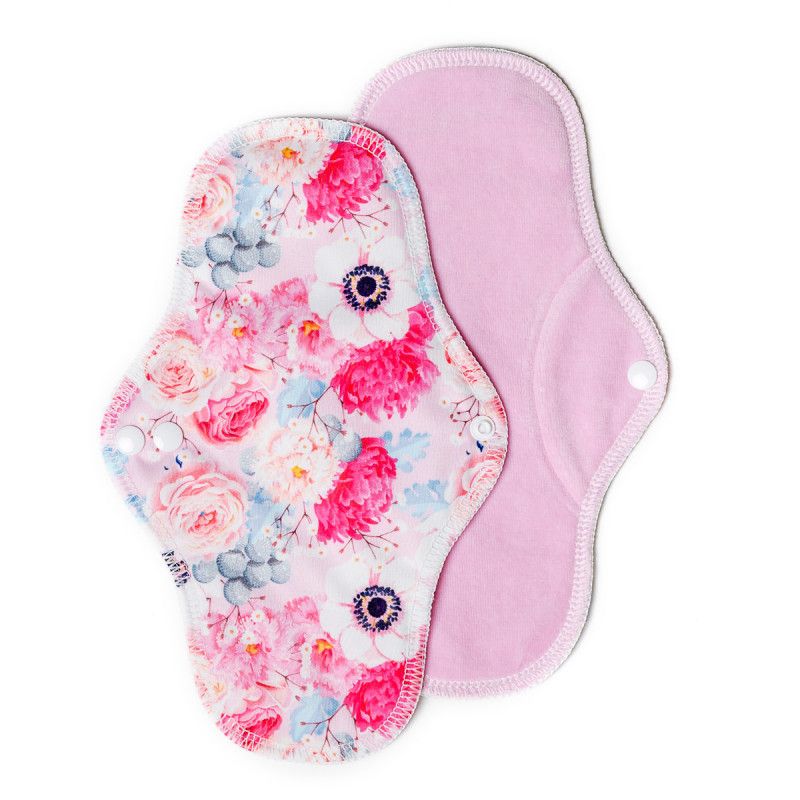 Zwei Stoffbinden. Eine mit Blumenmuster, die andere rosa. Beide haben Druckknöpfe und eine geschwungene Form.