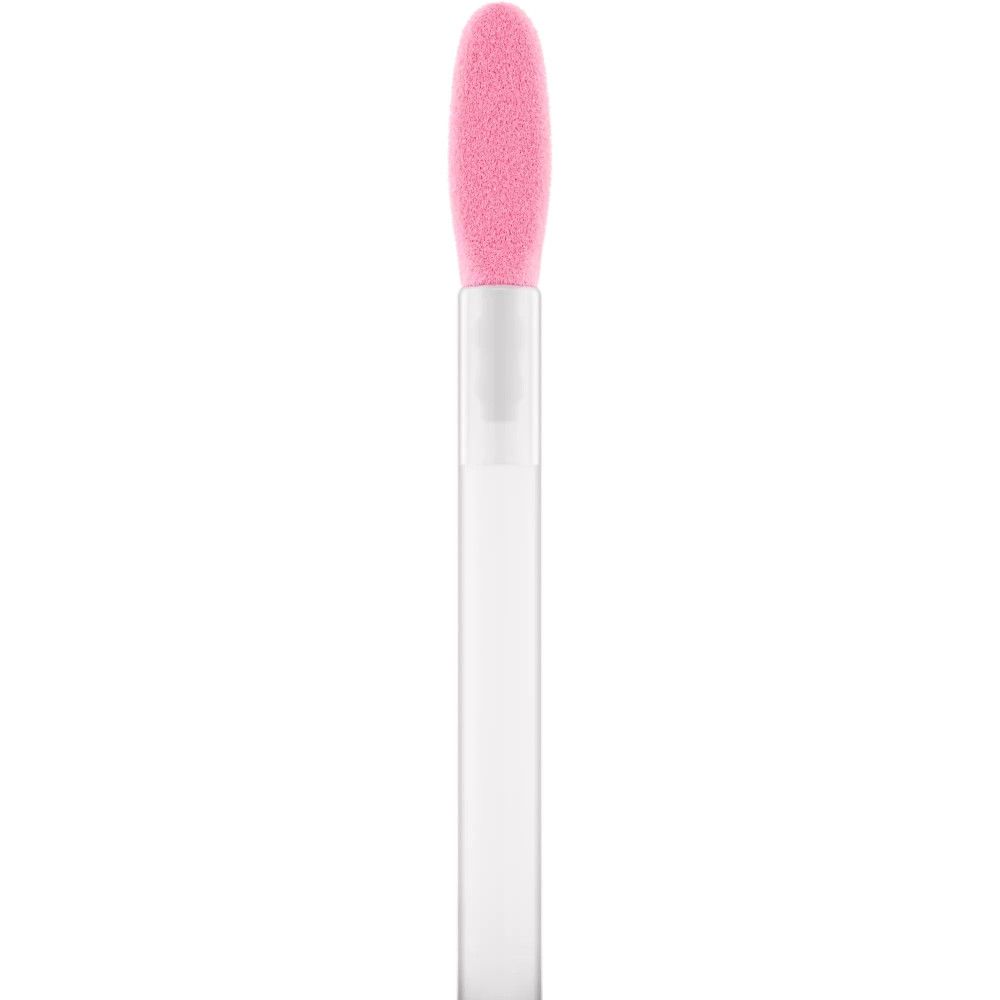 Ein transparenter Stiel mit einem ovalen, rosa Schaumstoffapplikator an der Spitze.