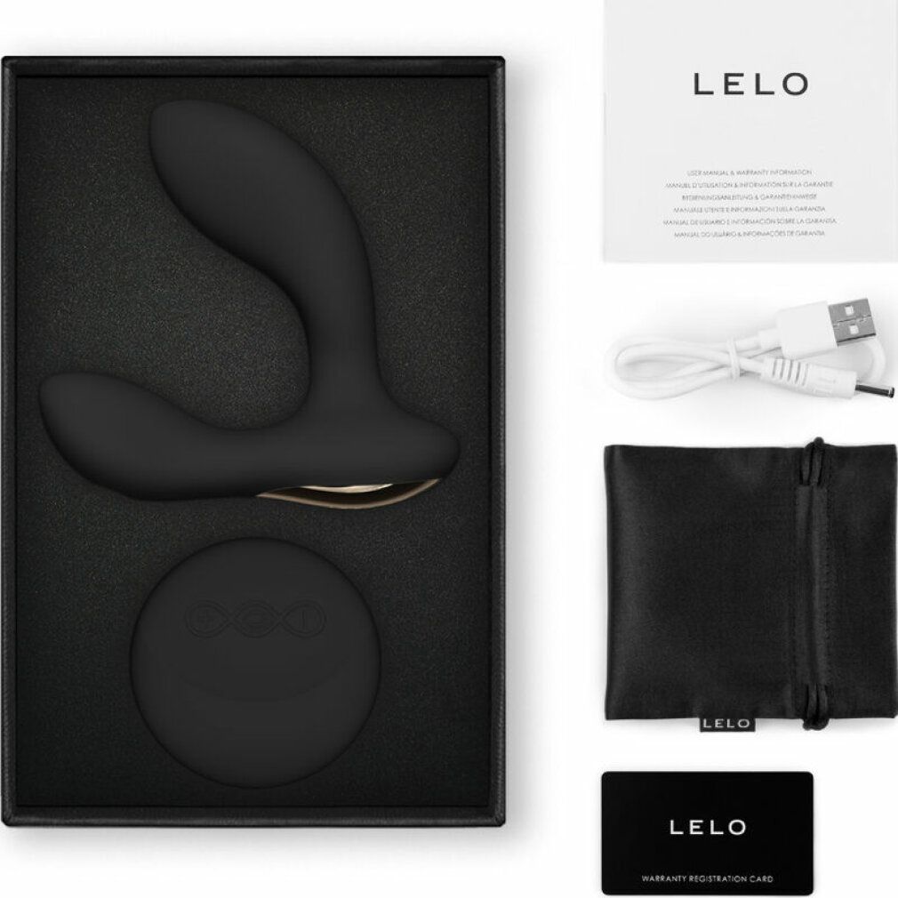 Schwarze Verpackung mit Produkt, Kabel, Beutel und Karte. LELO-Logo.
