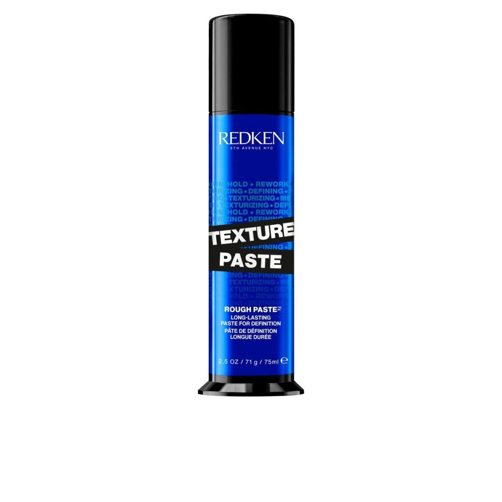 Zylindrische Tube mit schwarzem Deckel. Aufschrift: REDKEN, TEXTURE PASTE. Blaue und weiße Schrift. 75 ml.