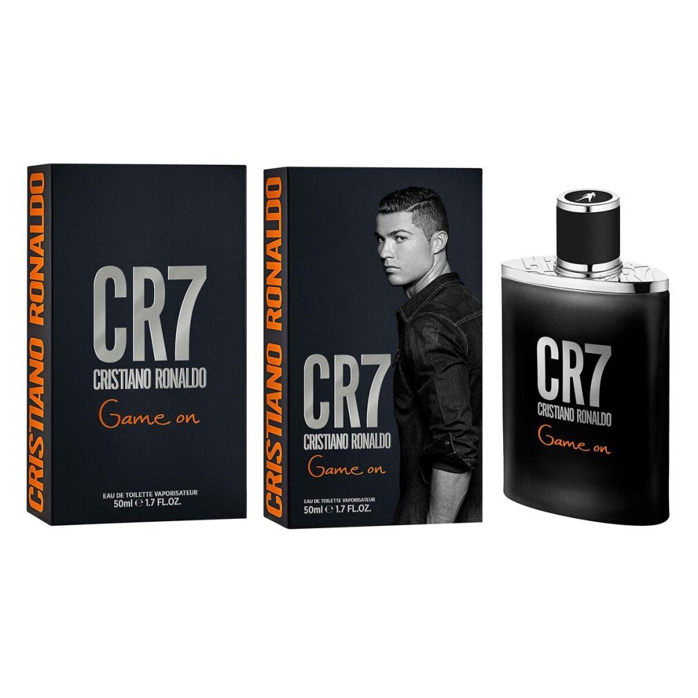 Schwarze Flasche CR7 Game On Eau de Toilette Spray. Silberner Verschluss, schwarzer Sprühkopf. Logo und Text.